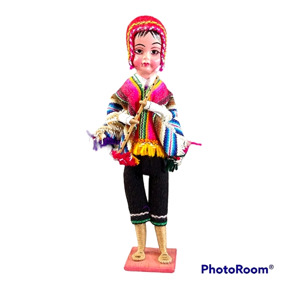 Vintage Peruvian flute player doll